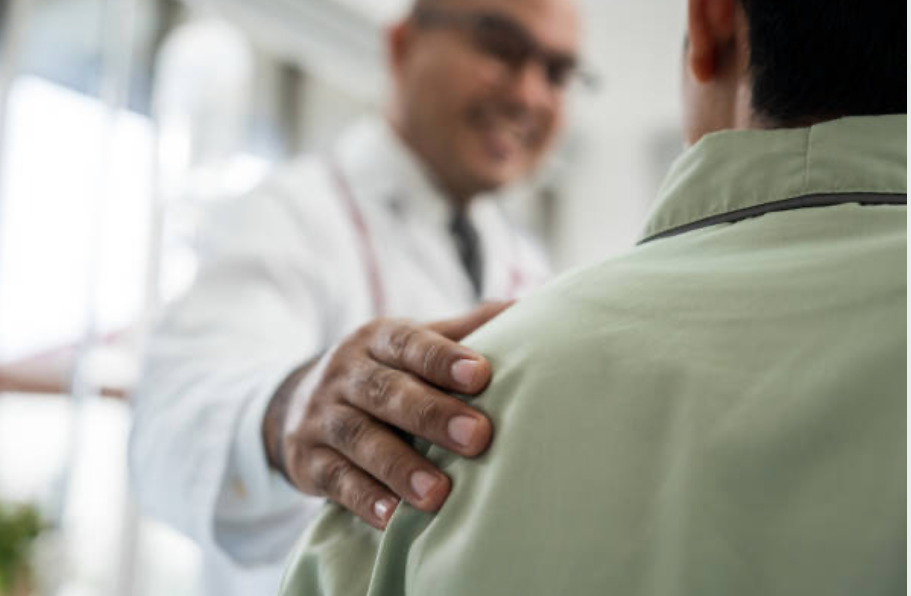 Doctor consulting with patient